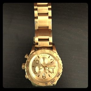 Gold Nixon watch