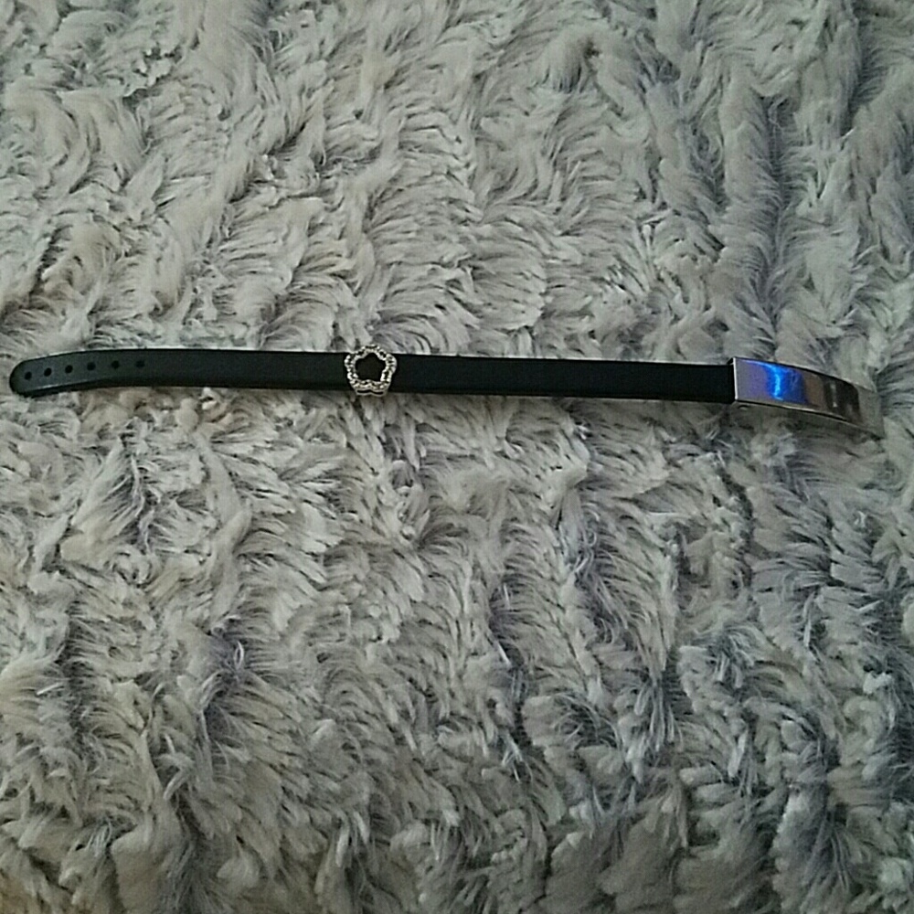 Black band bracelet with flower charm