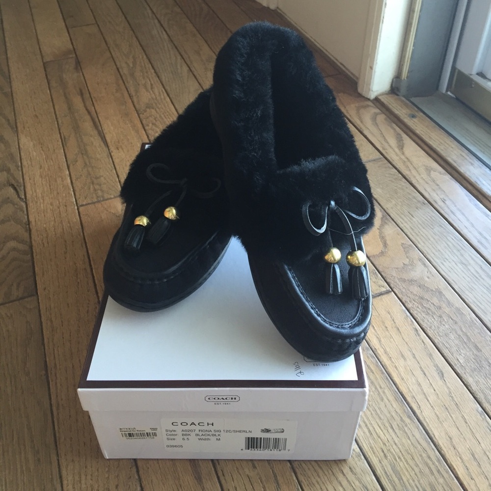 Black coach slippers 6.5.