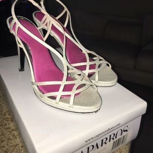Women's strap on silver heels by Caparros