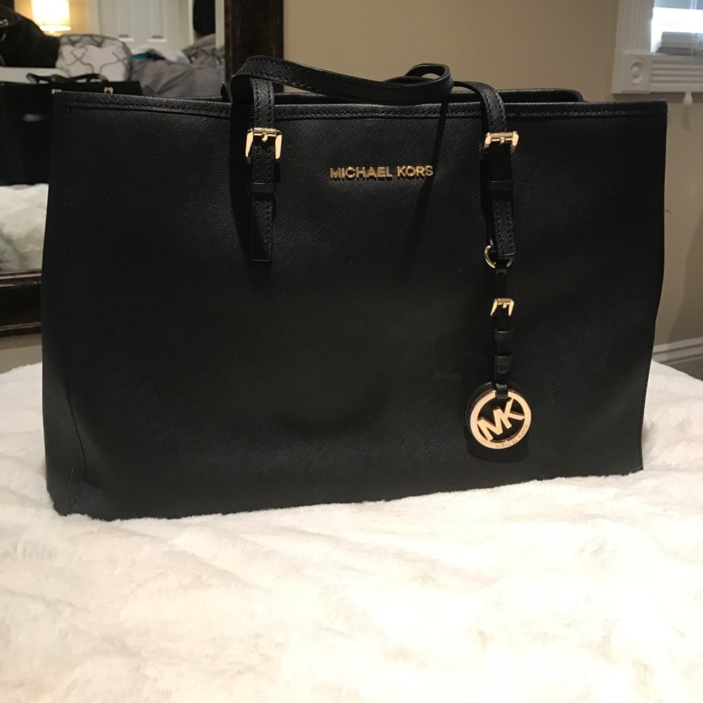 Michael Kors Black and gold handbag
