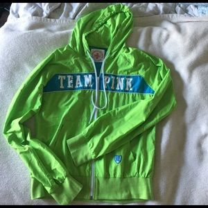 Lime green/blue rain jacket