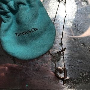 Used Tiffany's love pendant in sterling silver