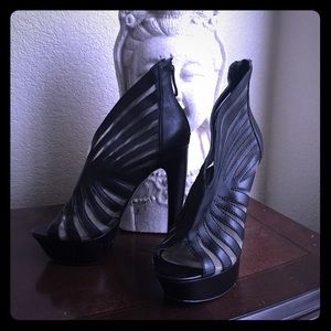 Super sexy Bebe cage-like platform heels.
