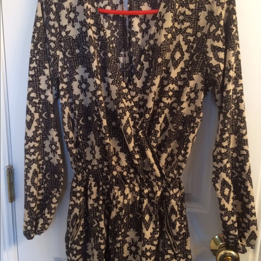 One piece short suit with zip pockets