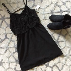 Brand new little black dress with beading