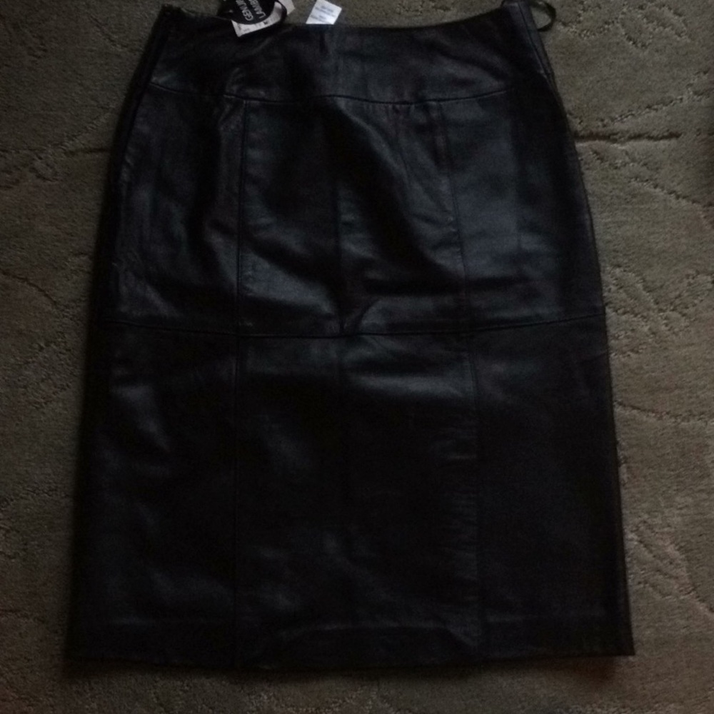 Brand new a little above the knee leather skirts