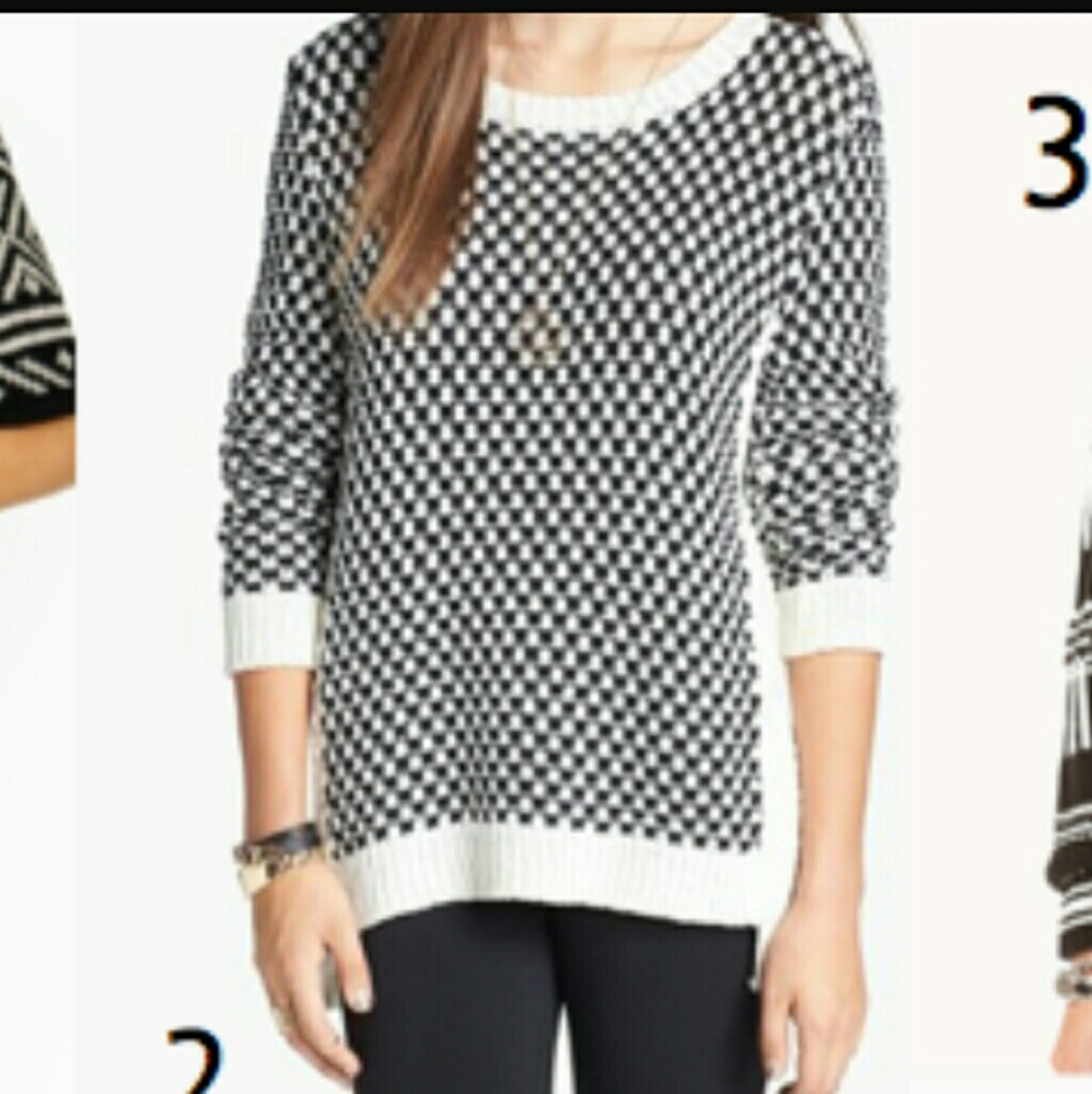 Long black and white checkered sweater.