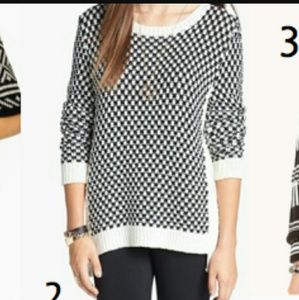 Long black and white checkered sweater.