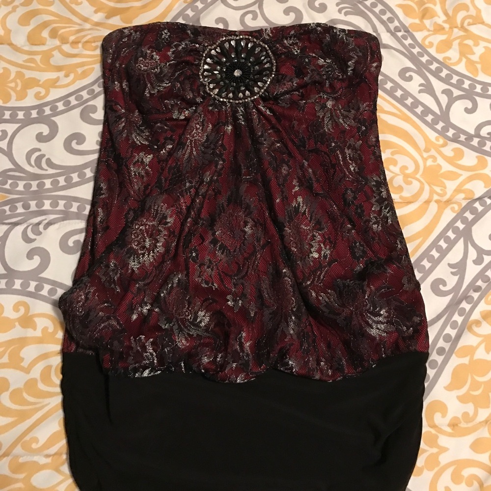 Red and black shimmer top.