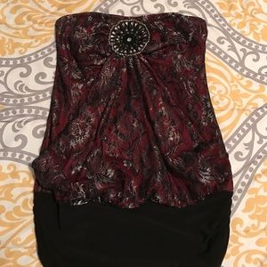 Red and black shimmer top.