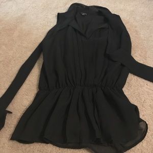 Black sleeveless shirt with sash for bow at top