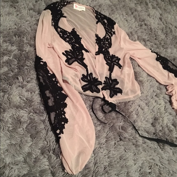 light pink blouse with black stitching - Picture 3 of 3