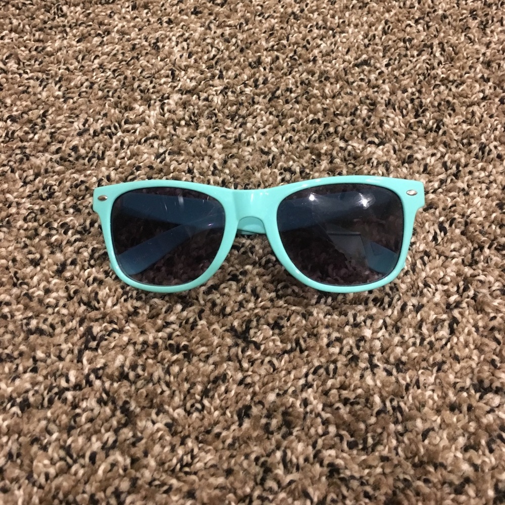 Teal new sunglasses barley worn