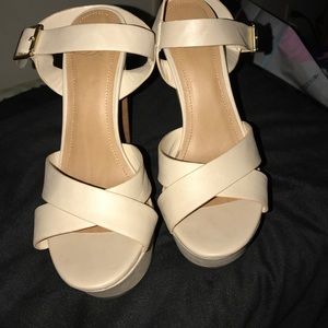 Nude strappy platform heels
