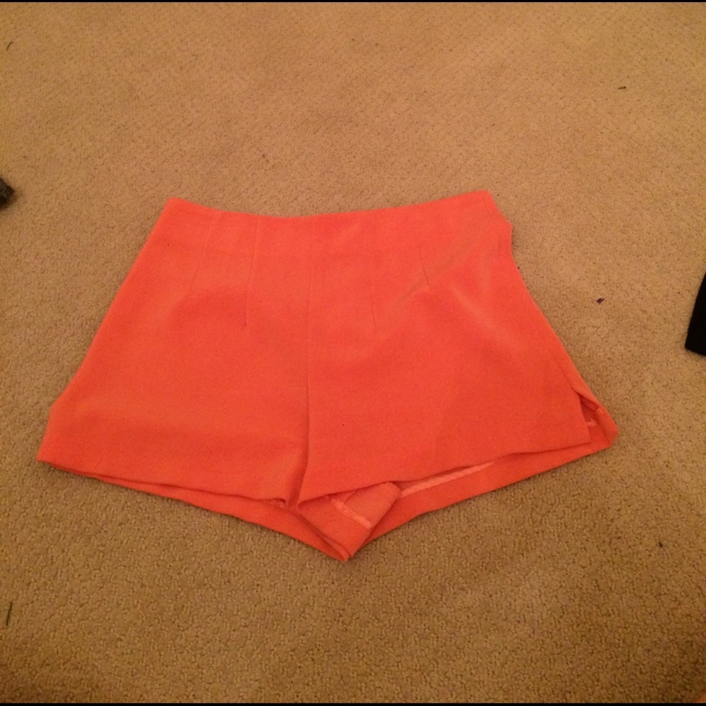 Bright pink high waisted shorts