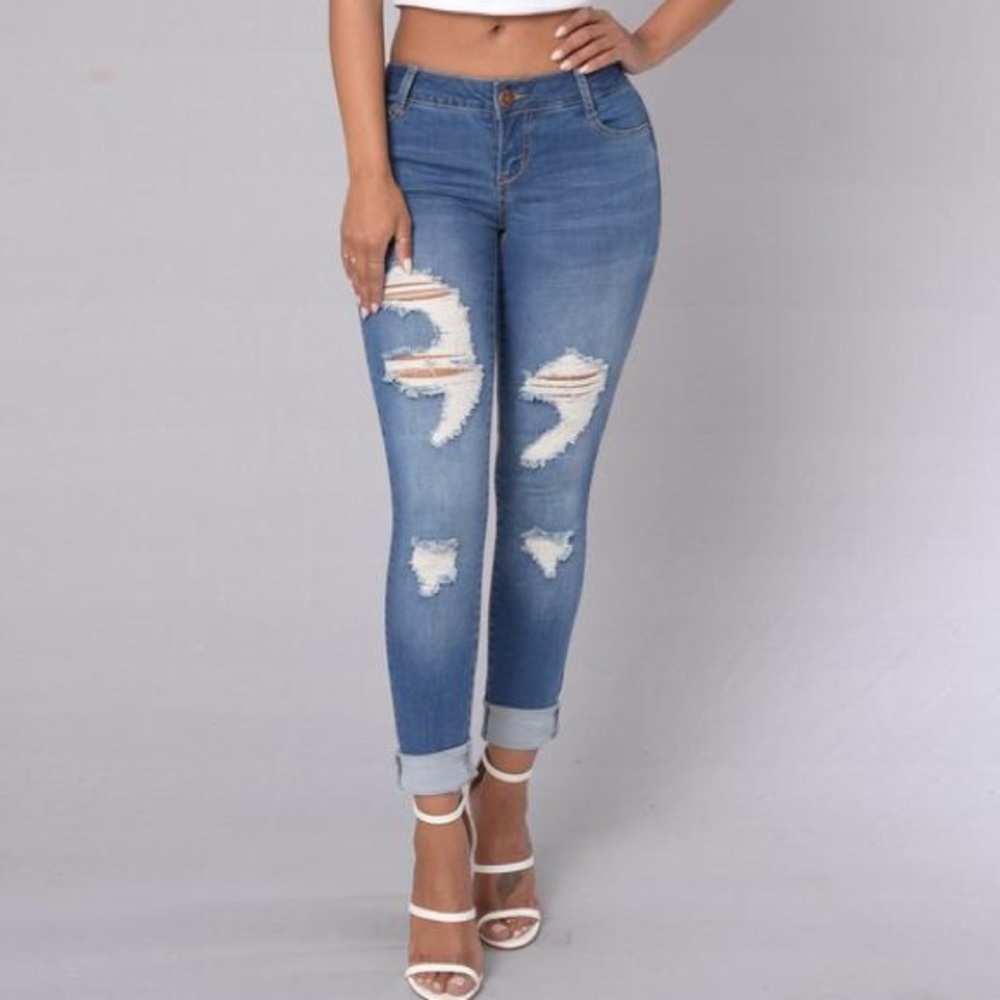 Dark wash destroyed jeans