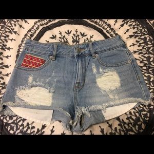 Denim shorts with embroidered pockets