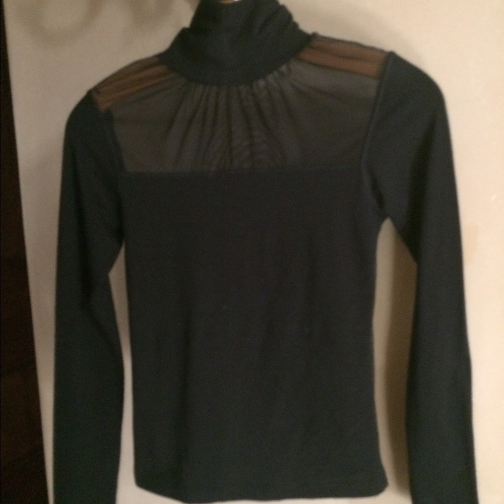 Kente kid/girls lycra/mesh turtleneck. Size 10