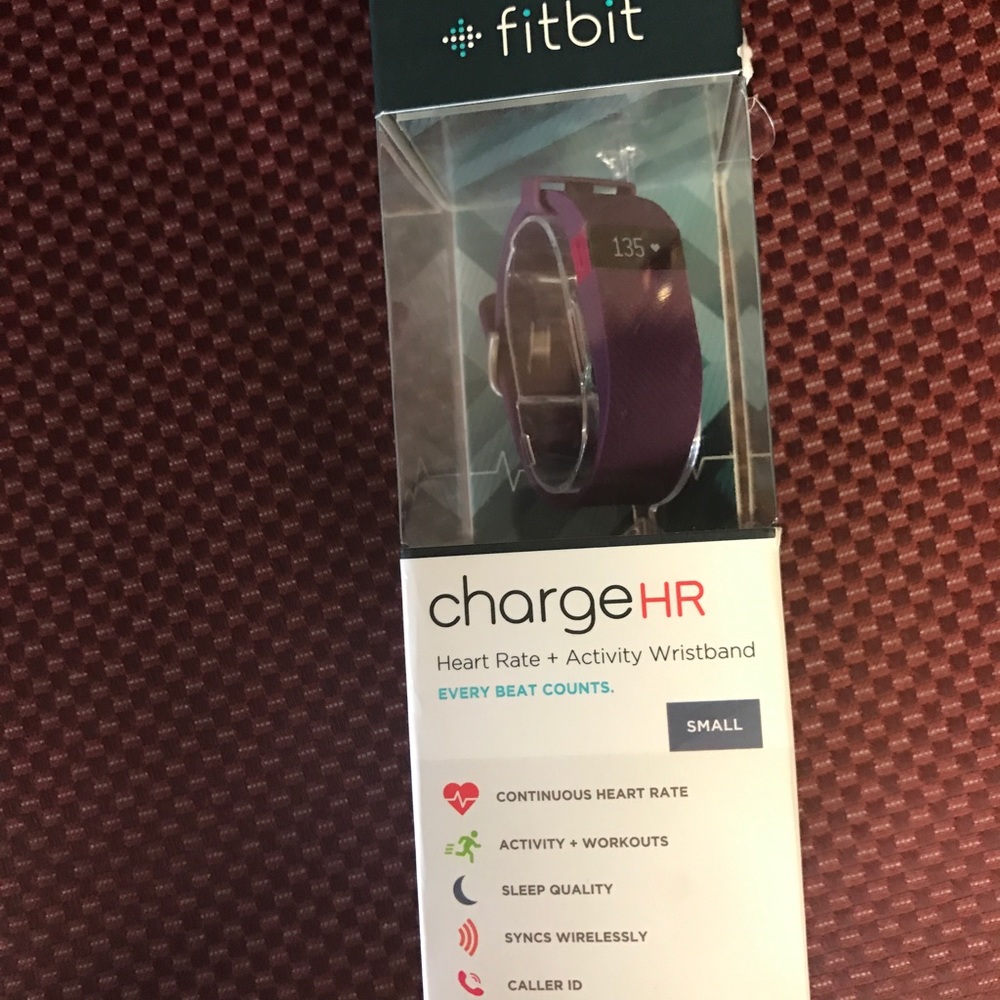 Purple Fitbit watch