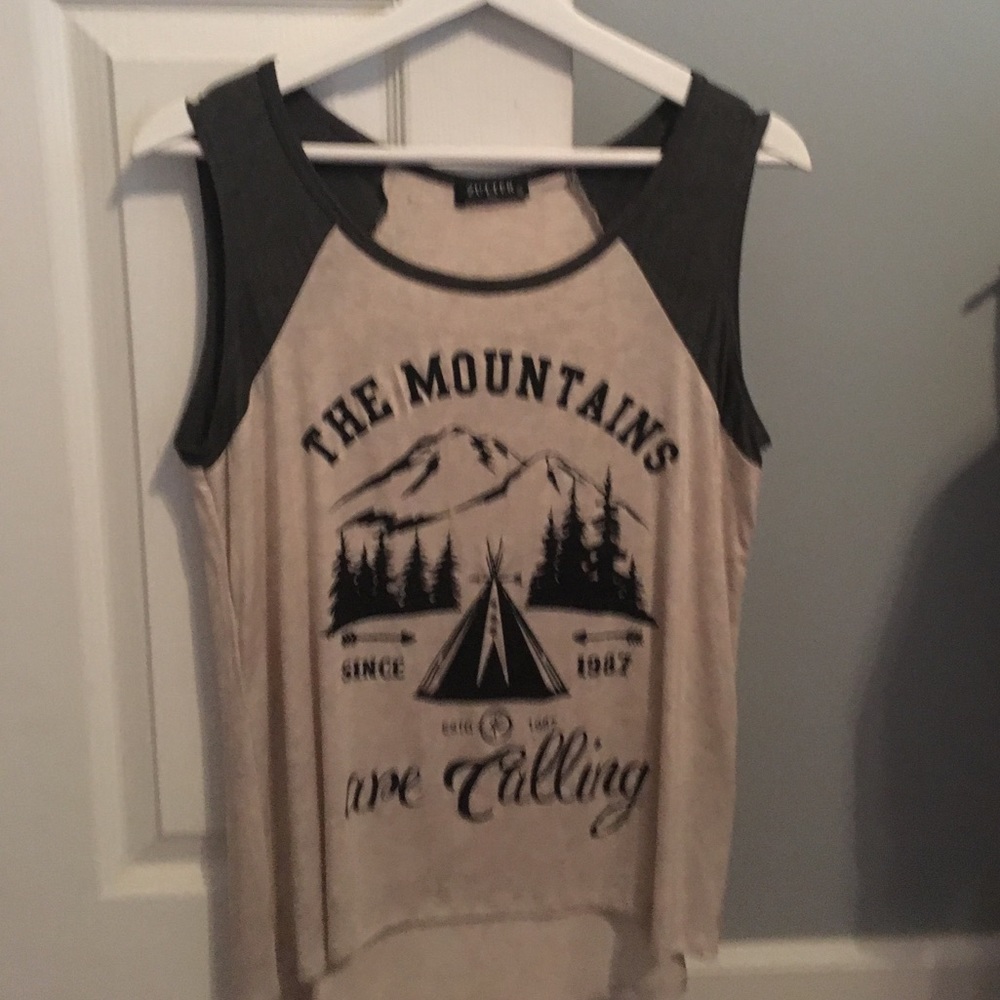Two "mountains are calling" muscle tanks