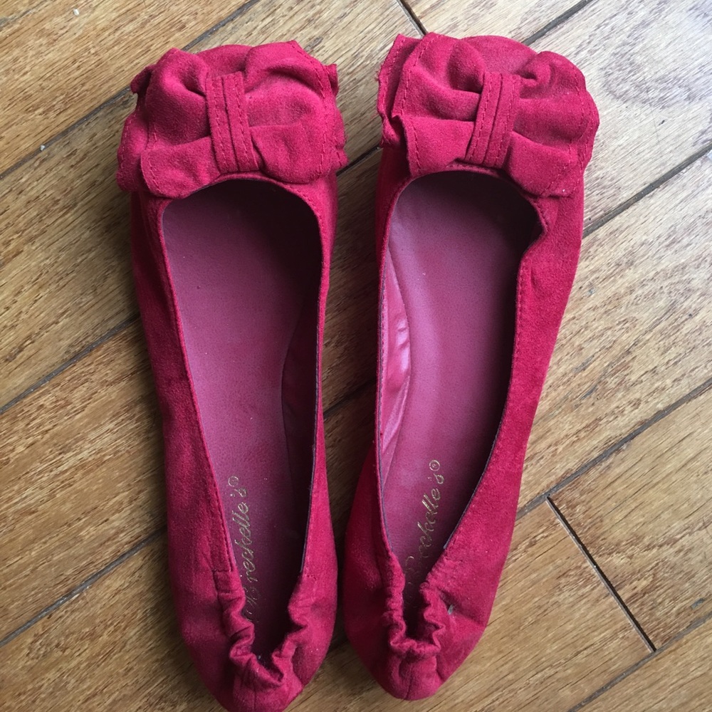 Red ballet flats with bow. Never worn.
