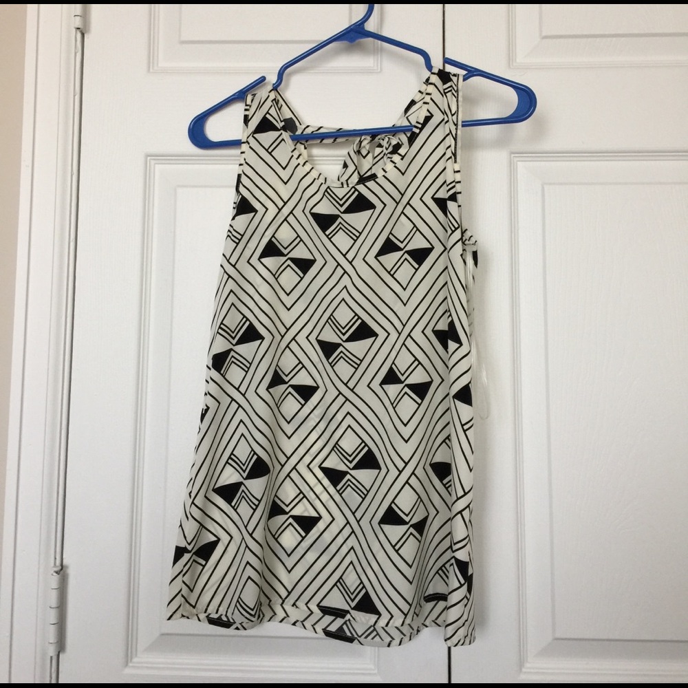 White tank with geometric design