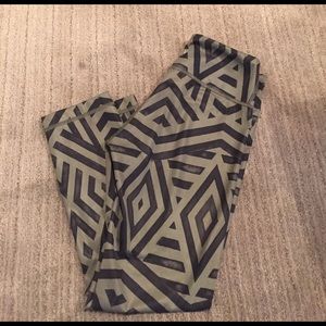 Olive green capris with black geometric pattern