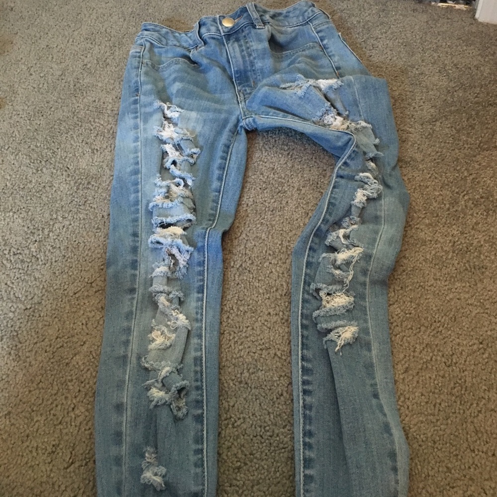 Light/ medium washed, ripped jeans