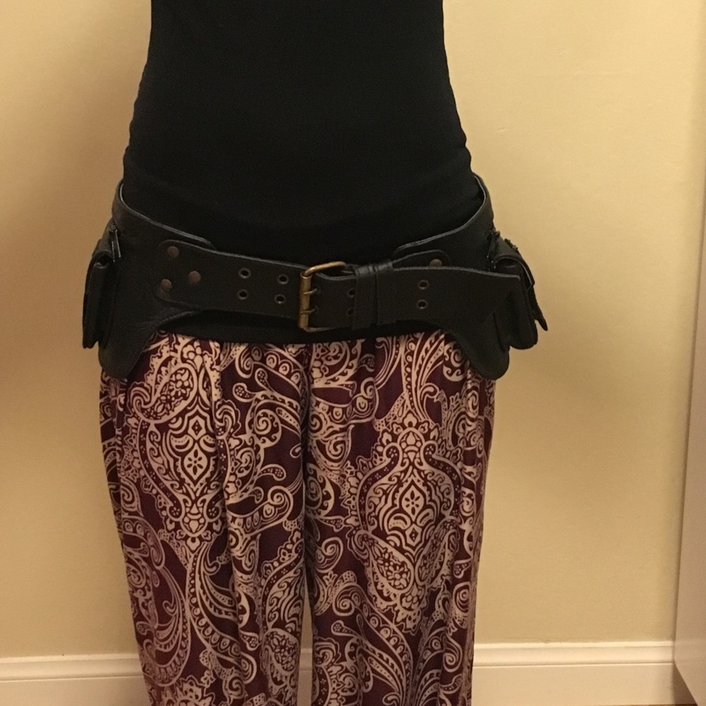 Adjustable leather utility belt.