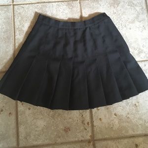 black pleated skirt