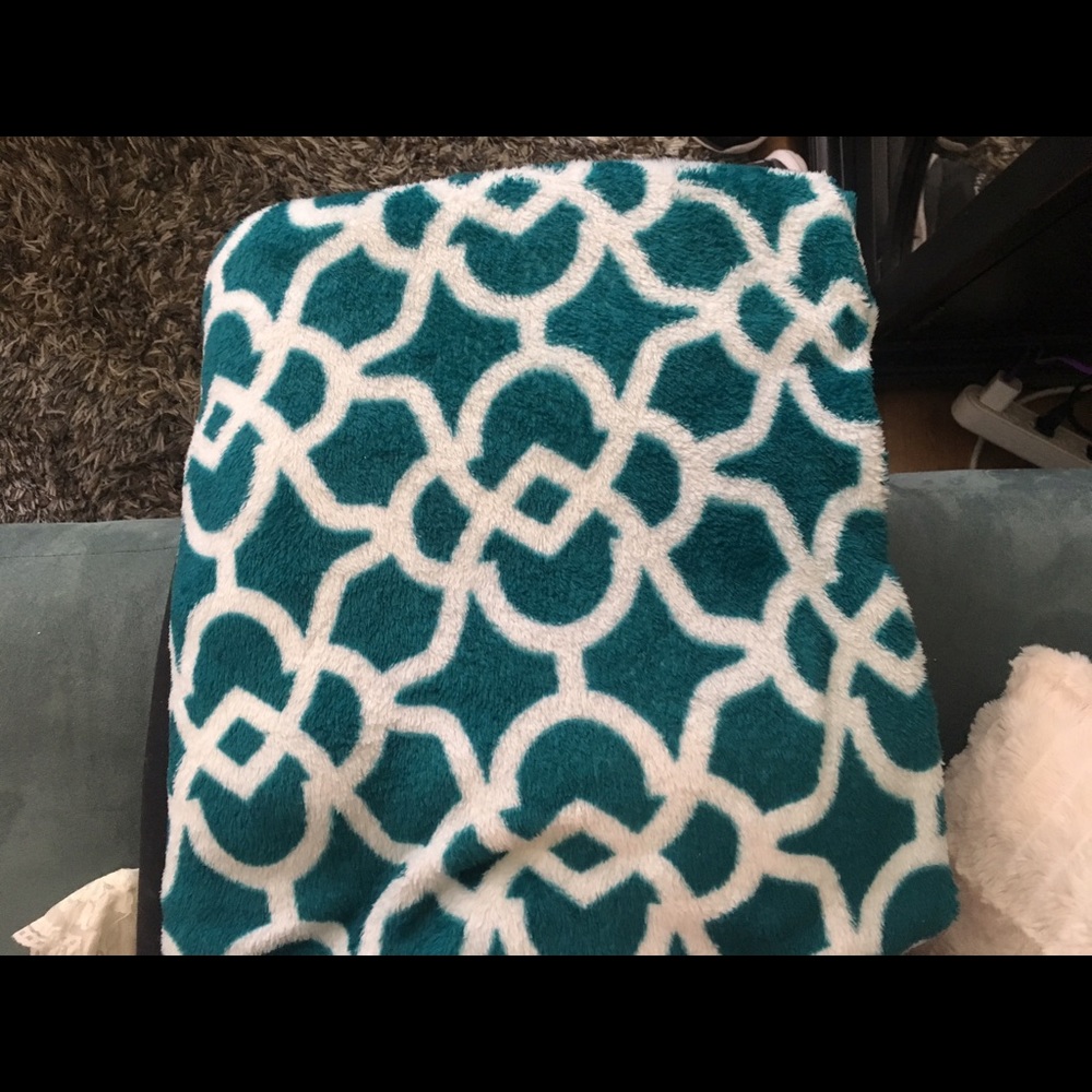 Blue and white throw blanket