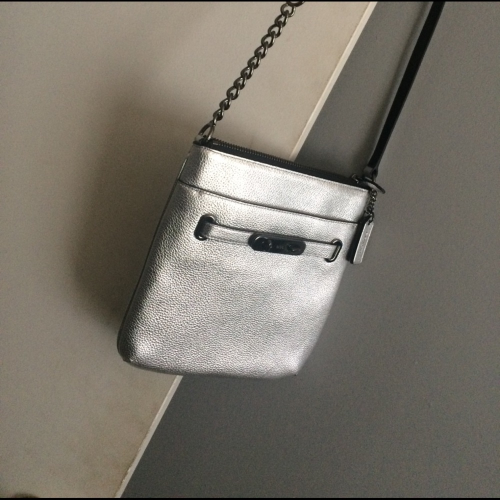 Coach purse silver in color, long strP.