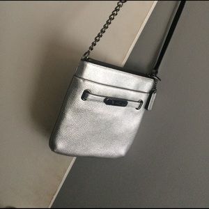 Coach purse silver in color, long strP.