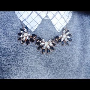 Black, white, and gold necklace