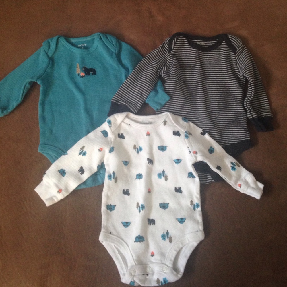 3 Carter's long sleeve onesie tops never worn