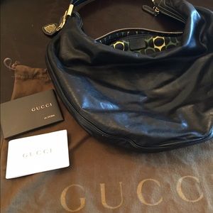 Authentic Gucci leather hobo handbag.