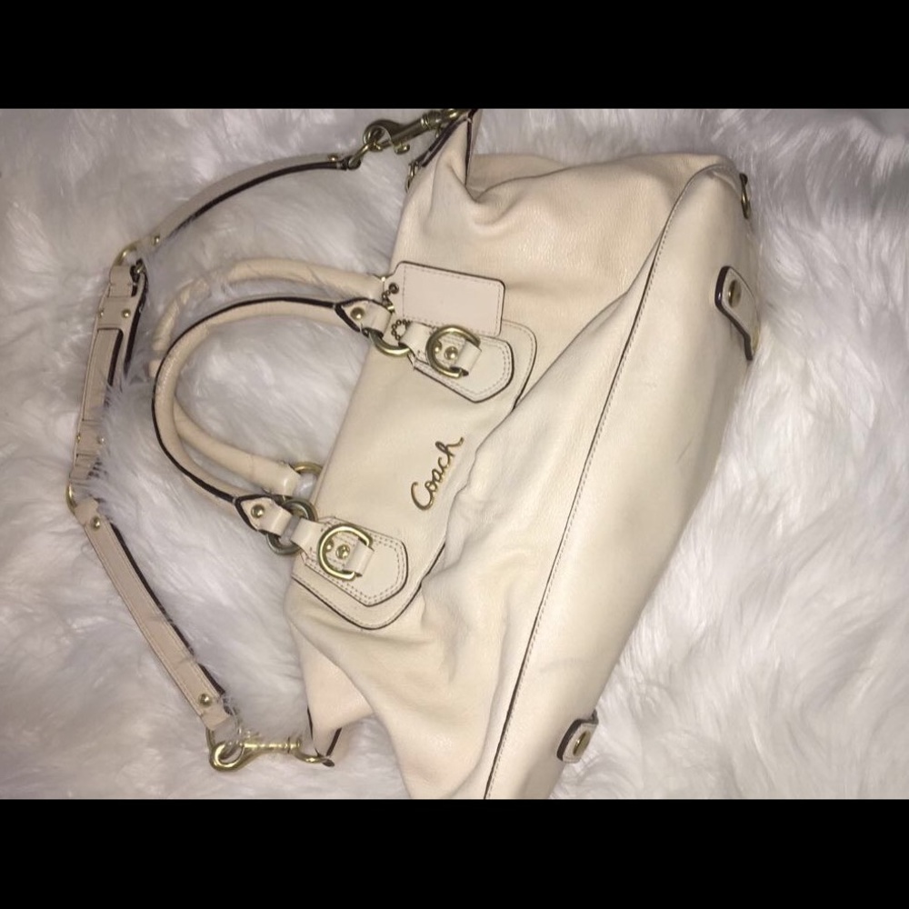 Beige Leather authentic Coach Hand tote.