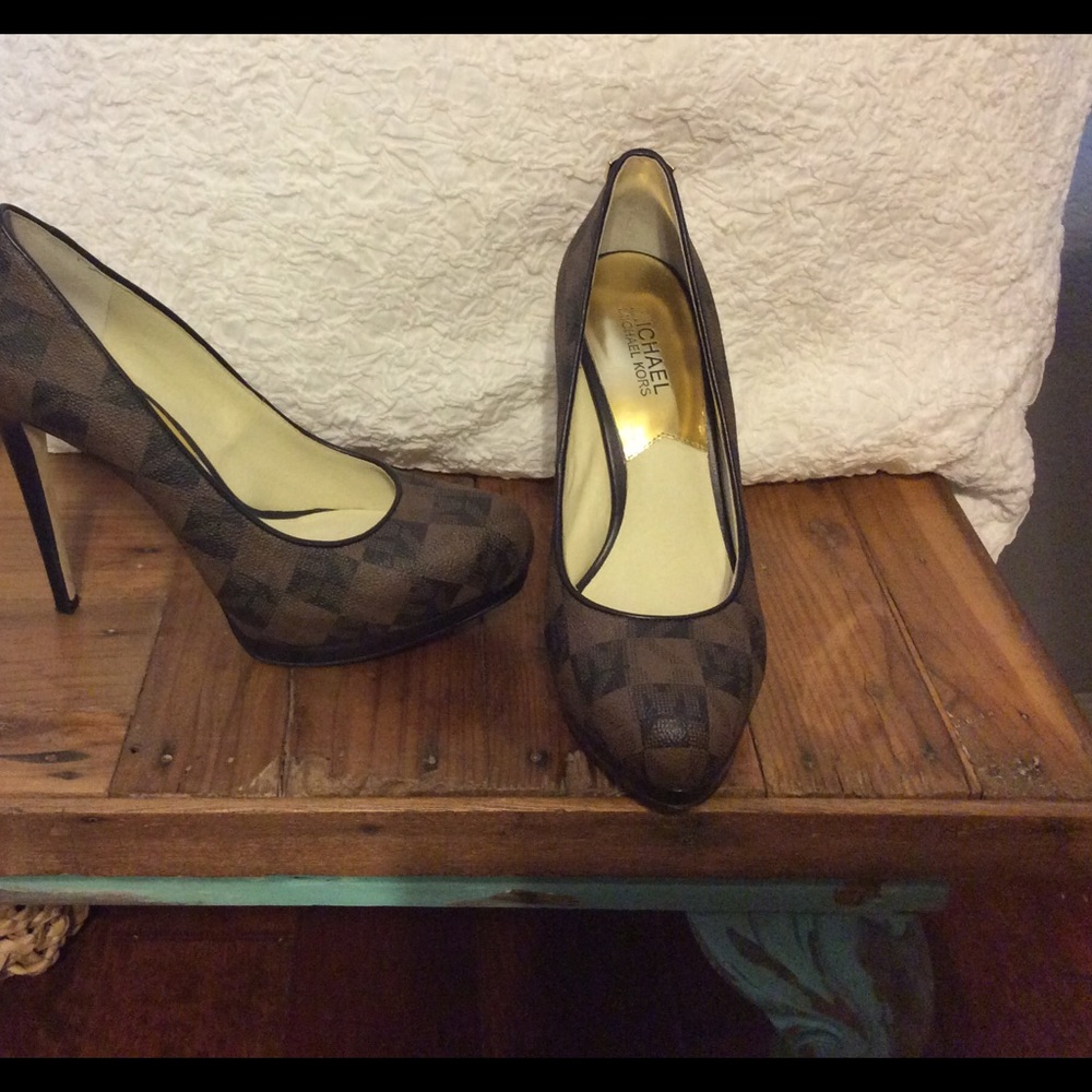 Micheal Kors signature brown and black 5' heels.