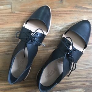 Loeffler Randall "Willa" in black leather.