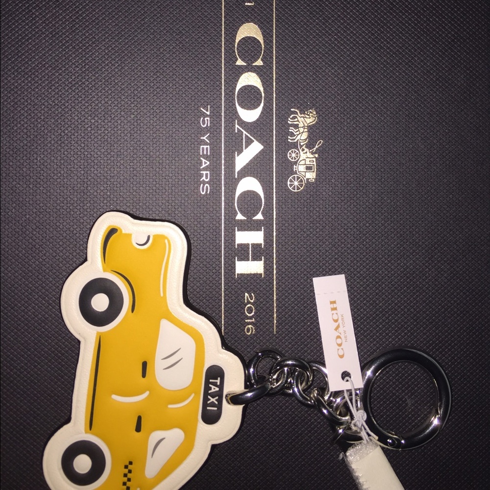 Coach Taxi charm