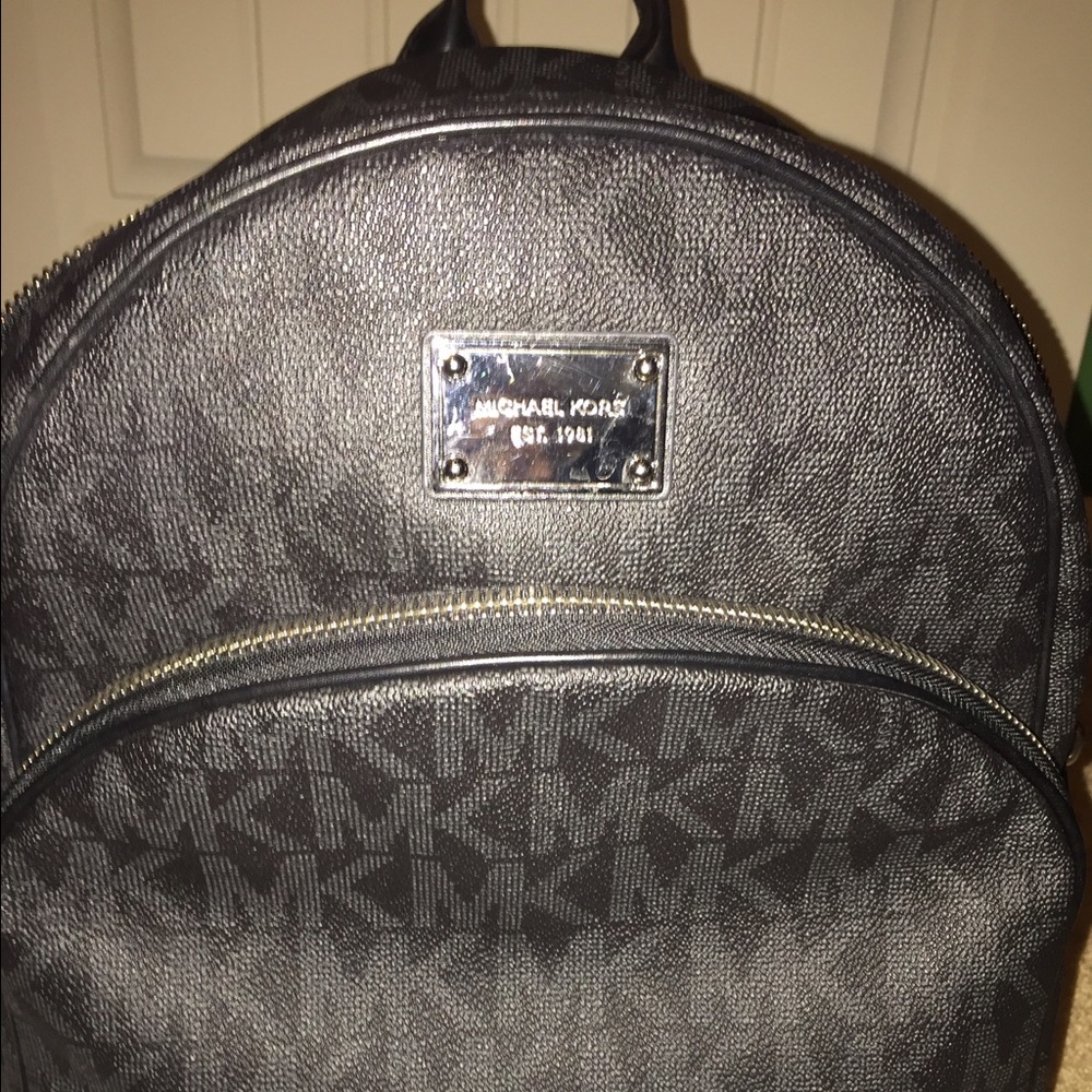 Authentic Michael Kors black backpack purse