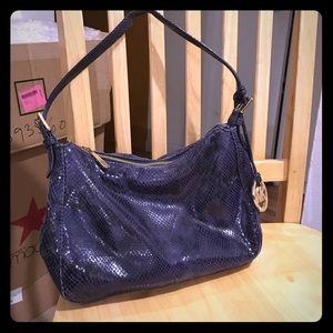 Authentic Michael Kors should bag. Shiny!