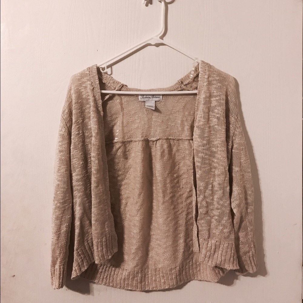 Soft, cozy, cream colored sweater.