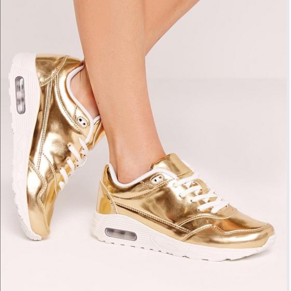 Mirrored gold trainers