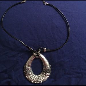 Silver Chico's pendant