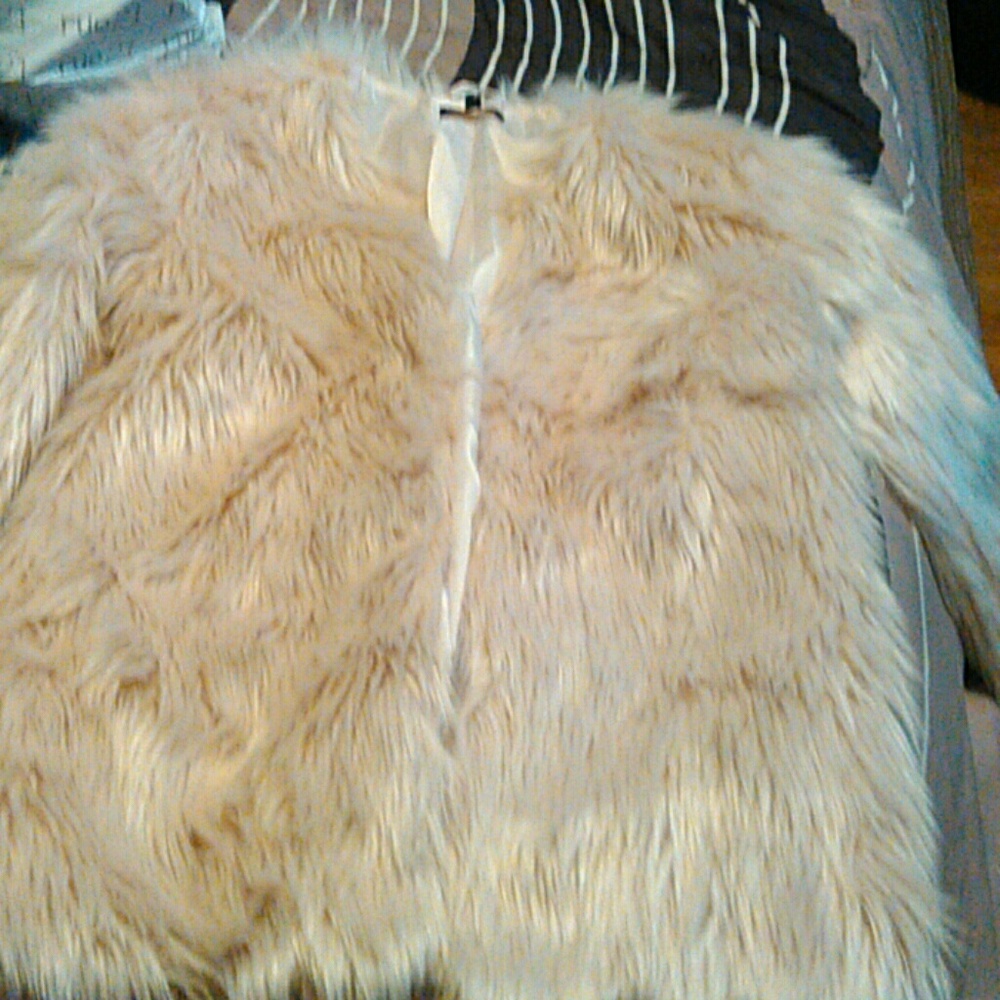 BRAND NEW. Soft fur winter coat.