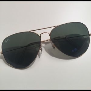 Black and gold ray ban aviators