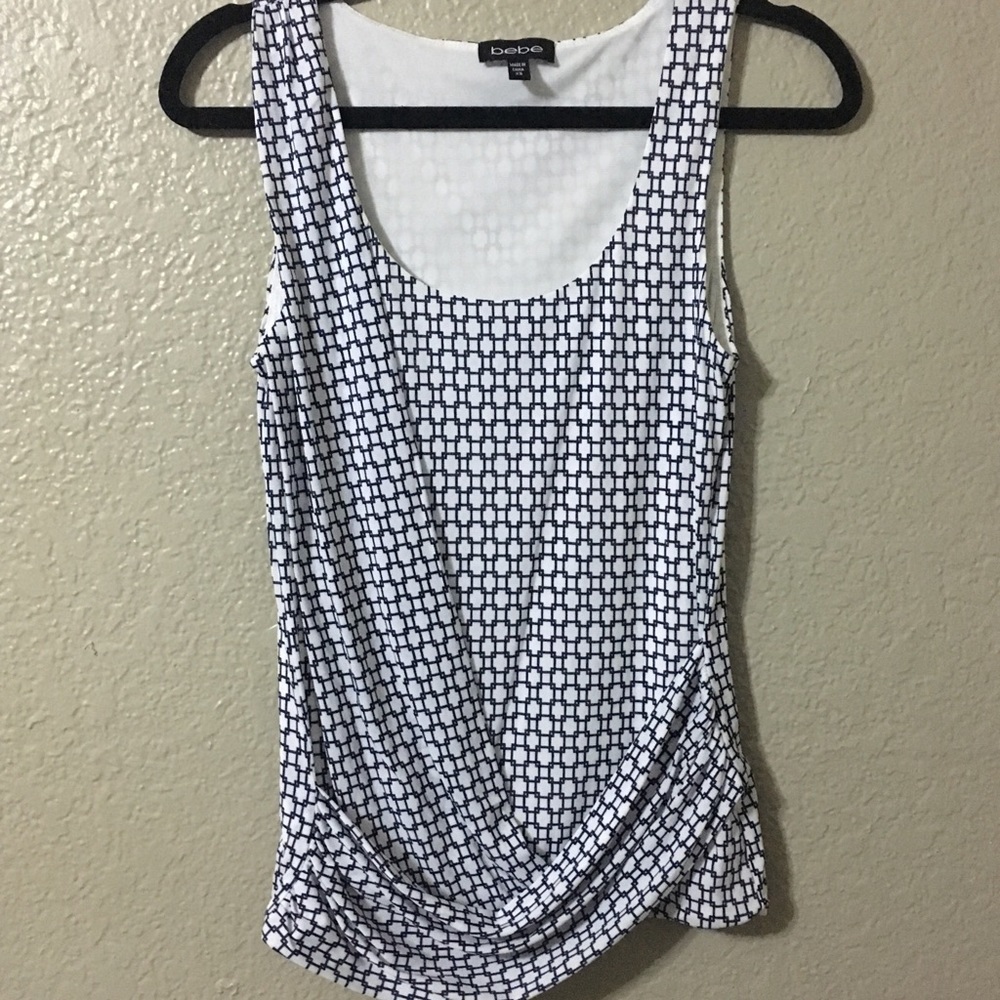 Bebe blue and white sleeveless shirt