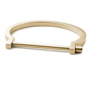 Miansai screw cuff.